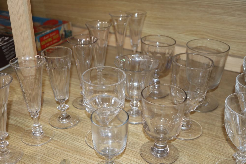 A quantity of glass rummers, flutes, etc.